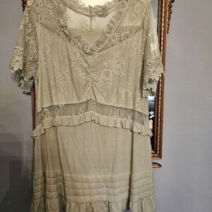 Light lace and ruffle sage green top.